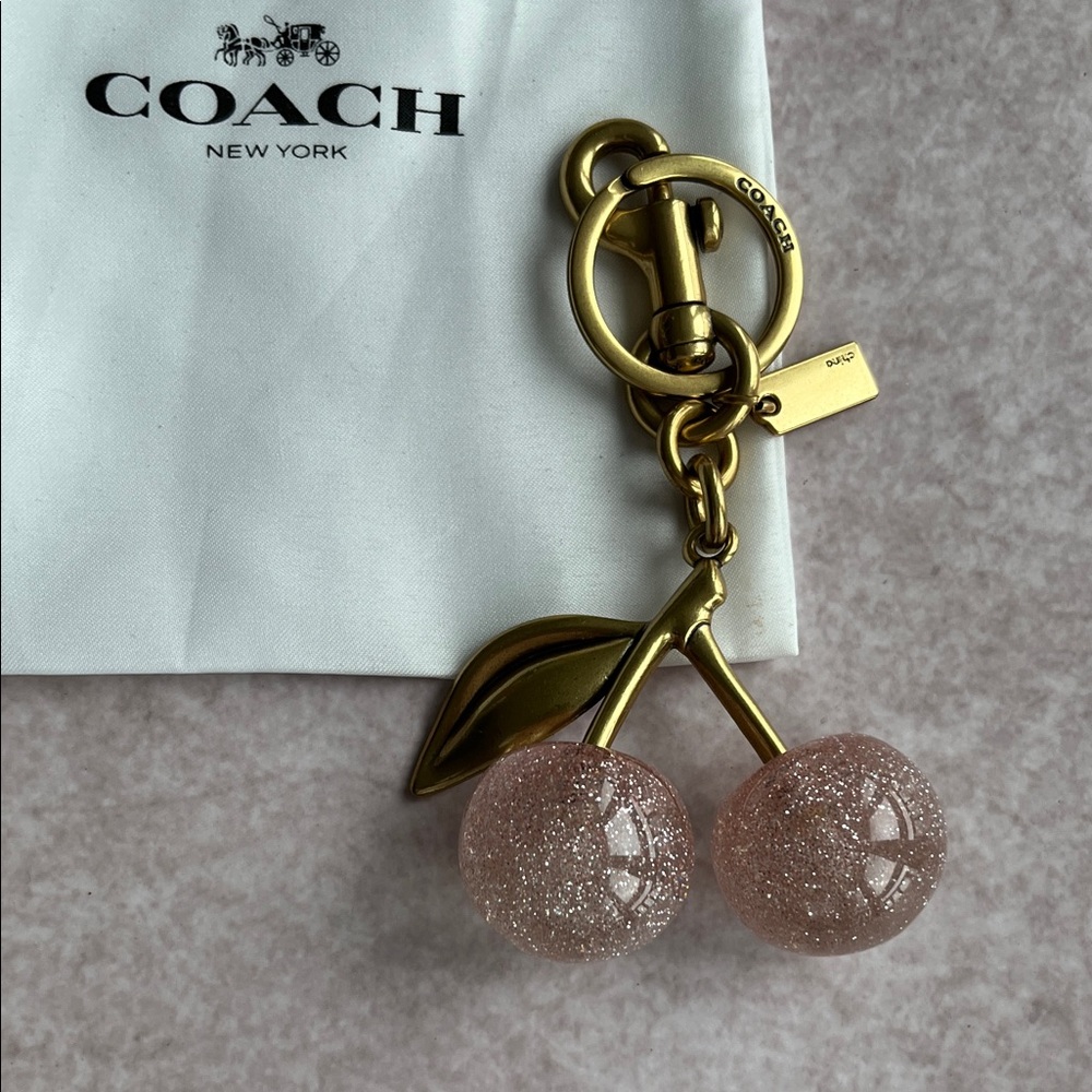 COACH Pink Glitter Cherry Bag Charm with Gold Hardware